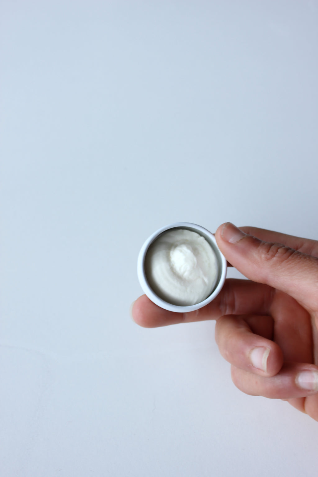 Open 15ml sample jar showing creamy whipped tallow balm texture