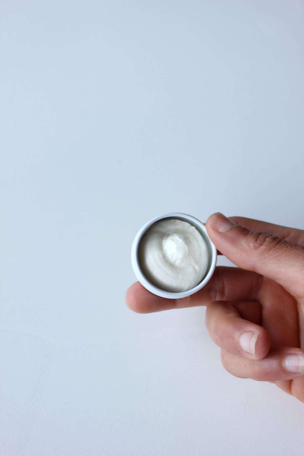 Open 15ml sample jar showing creamy whipped tallow balm texture